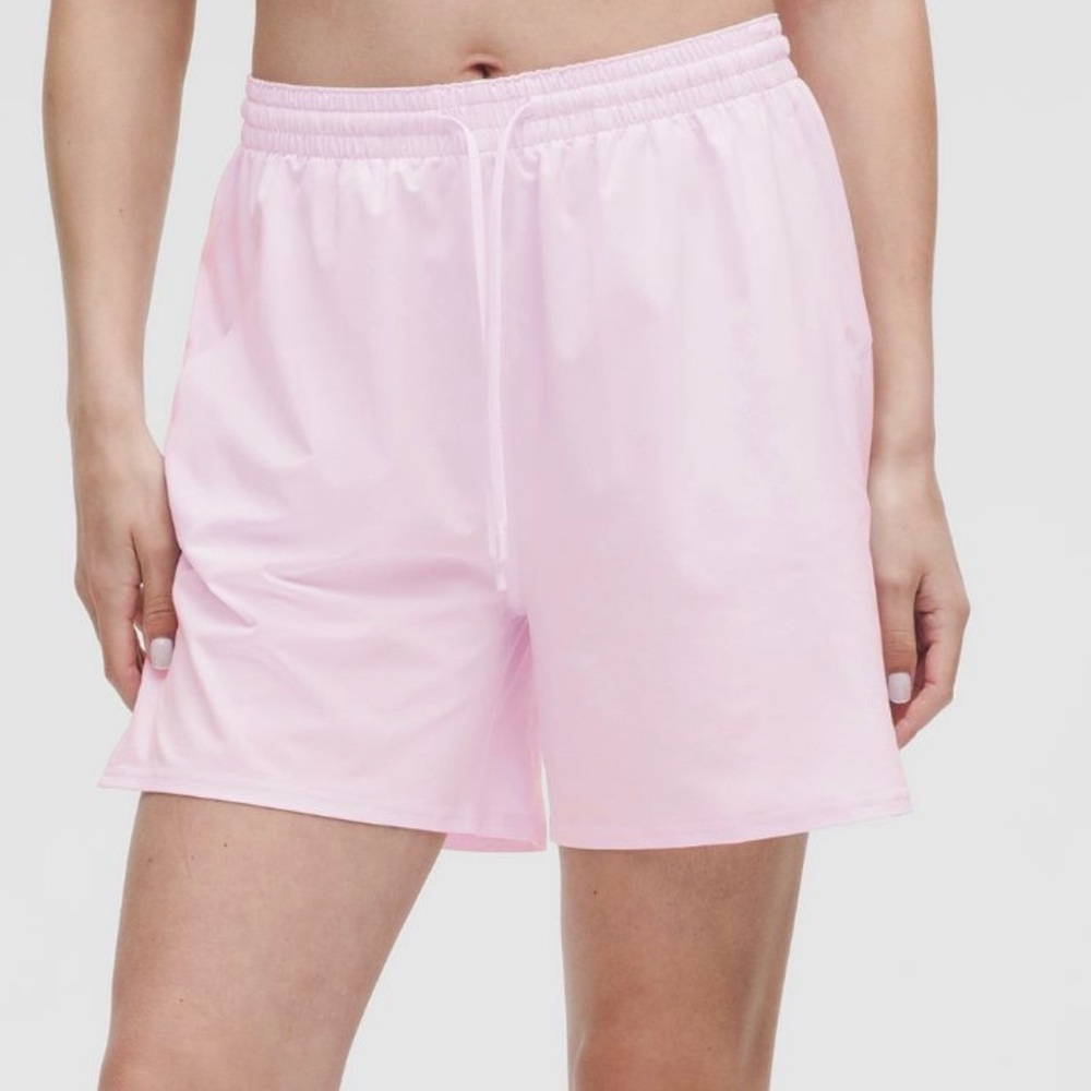 Lululemon Pace Rival High-Rise Short 5" in the color pink haze.
